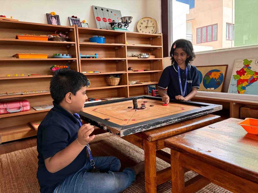 A mixed-age group of children in the Casa program (3-6 years) at Eduland Montessori, Banashankari, working independently and collaboratively with hands-on Montessori materials.
